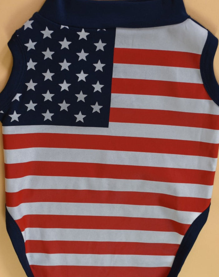 American flag patterned pet shirt on a beige background
